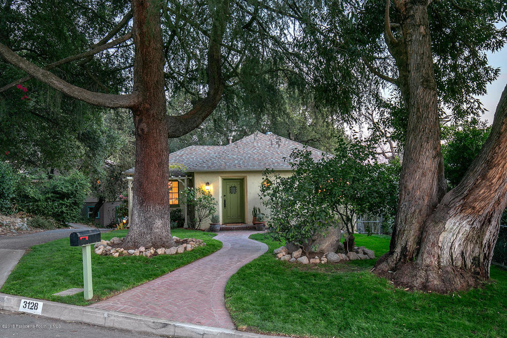 Holiday Special: this darling Cottage,updated, cozy & charming, move-in ready. Freshened landscaping, lemons galore, welcoming pathway leading to a cheerfully painted front door. Gleaming hardwood floors, new light fixtures, windows galore spectacular interior! All new interior paint, light & bright rooms, flowing floor plan; livability that makes sense, w/character. Living Room boasts a gorgeous fireplace, just redone, for functionality & aesthetics. Formal Dining Room French doors open to a spacious side patio-private, gated, perfect for alfresco dining w/ romantic lights strung above. Generously sized Kitchen has Pinterest Perfect cabinetry, new Quartz counters, new stainless steel dishwasher & cooktop! Two lovely, light filled Bedrooms, w/ hardwood floors & fresh, designer paint colors-soothing & welcoming. A large Bath features cast iron tub, shower & spacious vanity. If all of this isn't enough, there is a back patio, perfect for extra guests when you're entertaining & enjoying the So Cal indoor/outdoor lifestyle. Not enough still, you say?? A bonus space, perfect for a home office (241 sq ft), down a little flight of stairs, w/ window & direct access to patio. All you could wish for on a prestigious & lovely street. Come see for yourself!!