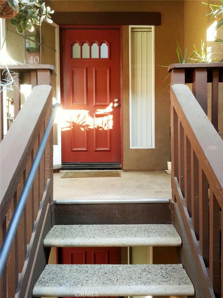 ** Priced to Sell ** Charming RSM Condo. Master Bedroom/Bath located on main floor with upstairs loft. Balcony on each level with lovely views of Rancho Santa Margarita Lake. Vaulted ceilings give this 869 sf home an open and airy concept inside. Efficient kitchen with breakfast bar opens to dining and family rooms. Inside laundry. One car garage and one assigned, covered carport accompany this property. Interior needs a little TLC. Great home for first-time home buyer or Investor client. Must see!!