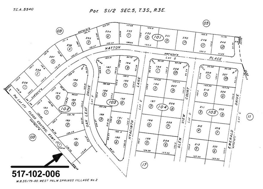 Raw land on paved road.  Water is in front of the property.
