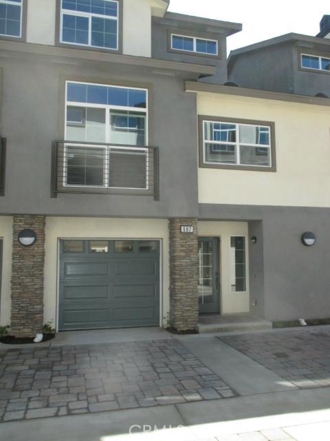 Take advantage of our pre-model grand opening pricing on this home only.
Beautiful brand new townhome located in the gated Seabright community in Costa Mesa. Spacious 1,727 sq.ft home with 2 beds, 2.5 baths, 2 car attached garage with private balcony and rear yard.
This homes features GE stainless steel appliances, incl. Stove, microwave and dishwasher. 9 foot ceilings, structured wiring system with RG6 Cable and CAT5 Phone wiring for state of the art communication and networking, pre-wired for ceiling fan in all bedrooms, plus approx. $16,800. in additional upgrades as follows:
* Upgraded security system
* Upgraded stairs system - espresso
* London Grey Caesarstone slab at kitchen countertop with full back plash in Eleganza Bolle
* Upgraded Classico Caesarstone slab at master pullman with Emser back splash, Eleganza Modern Series at Master tub deck and shower.
* Upgraded backplash at bath 2 with Eleganza Bolle
* Upgraded baacksplash at powder with Emser Meshmount Mosaic
This is new construction so buyers can still select the flooring (see sales associate for flooring sample). This home is ready for a quick closing!
Pictures shown are of the model and are for illustrative only.