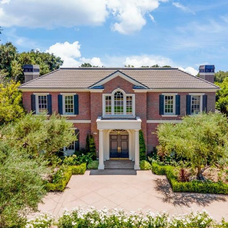 Spectacular Estate in the Upper Rancho of Arcadia. The 10,927 sq.ft. luxury splendid house in Arcadia's prestigious area features 6 bedrooms and 8 baths. Circular driveway is surrounding by the beautiful garden. This magnificent estate has grand entryway with chandelier and 28 foot rotunda ceiling will be whispers of delight among guests. The kitchen featuring top brand appliances. Lovely family room with wet bar and media center and the house included a 10-person home theater!!!. Ascending the dual grand staircase or private elevator, to your expansive master suite for complete relaxation and incomparable spa bathroom. All bedrooms are suited. Home yoga/gym offers dry sauna. Private home office/library is adorned with amazing wood and northern light. Outdoor BBQ and dining bar with kitchen is for perfect entertaining poolside.