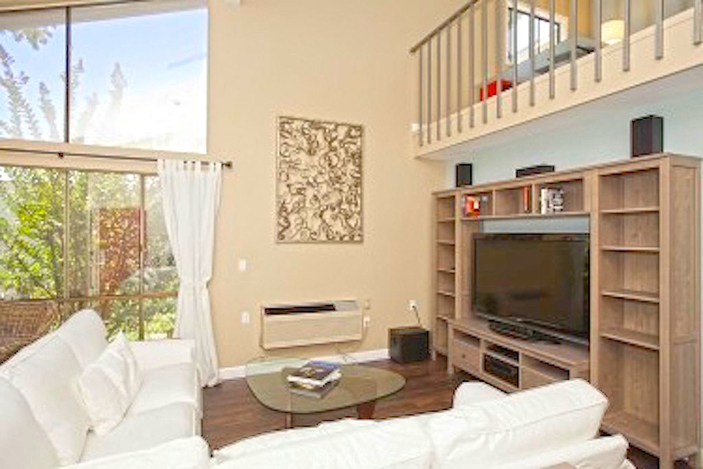 Why commit to buying when you can lease this beautifully updated and remodeled residence in Laguna Woods, which is reserved for homebuyers 55 and better? Conveniently located inside Gate 5, the 2-story design is bright and open with large, tinted windows, airy volume ceilings, a versatile loft, wood-inspired flooring, 2 bedrooms, 2 freshly upgraded baths with vessel sinks, and more. Spanning approx. 1,324 s.f., the stylish residence boasts a custom-caliber kitchen with dark stained wood cabinetry, granite countertops, contemporary tile backsplash, recessed lighting and stainless steel appliances. A high-end washer and dryer package adds convenience, and a large and private patio is ideal for enjoying the outdoors. Guard-gated Laguna Woods is home to 27 holes of golf, 7 clubhouses, 5 swimming pools, 2 fitness centers, and more than 250 clubs–all set among park-like grounds with an abundance of open space and mature landscaping.