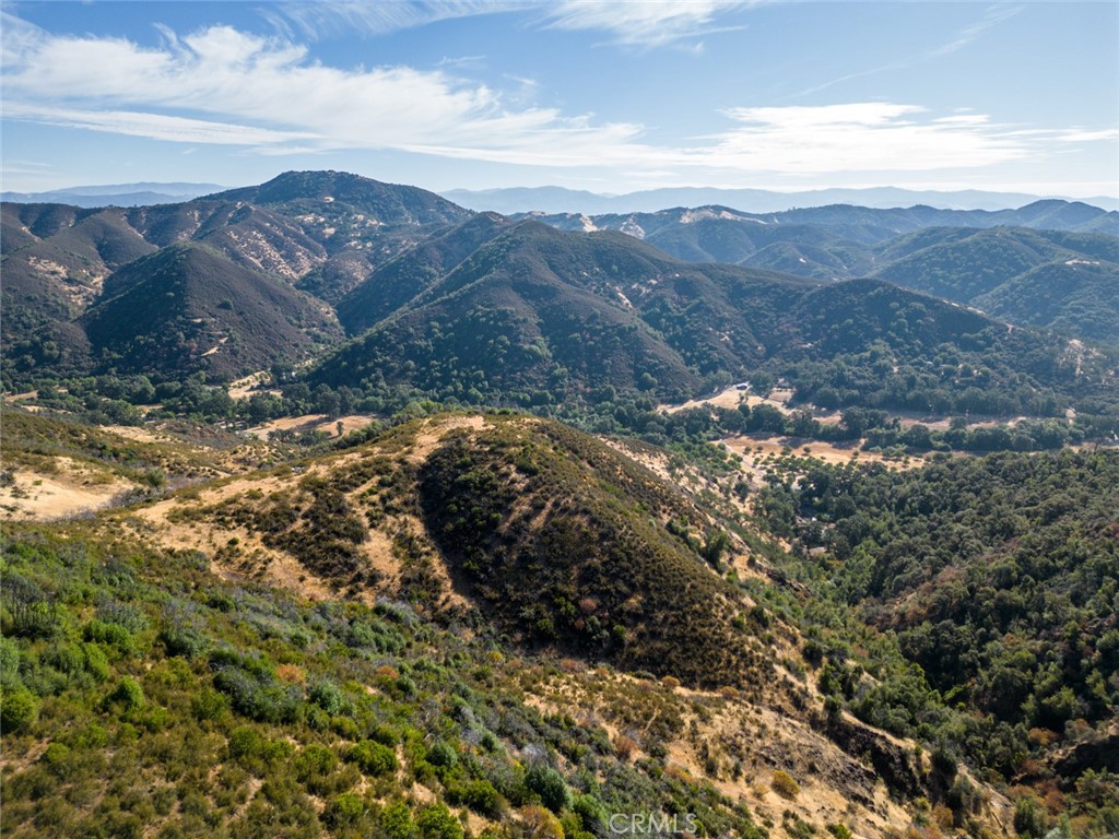 Nestled on 39 acres of pristine land, 7265 Scotts Valley Rd offers a unique blend of recreation and natural beauty. This expansive property boasts panoramic views and a possible home site, making it a perfect retreat for those seeking tranquility and adventure. With its private view of Clear Lake, this land is ideal for outdoor enthusiasts, offering opportunities for hunting, ATV rides, and exploring the extensive network of trails. Whether you're envisioning a serene getaway or a future home surrounded by nature, this property is a rare find that promises endless possibilities.