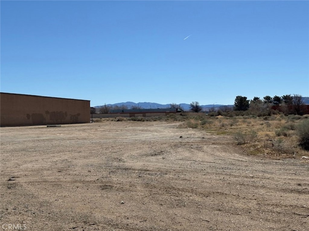 This valuable 4.65-acre lot in Palmdale offers endless possibilities in the growing economic future of Palmdale and for your commercial aspirations. This prime location is just around the corner from the new Trader Joes Distribution Center which encompasses over a million square feet of new construction space. The zoning of this property is intended to accommodate a diverse mixture of businesses that provide niche/specialty goods and services, such as lodging, convenience retail, professional & medical offices & similar uses that are aimed largely at regional visitors, workers and other highway traffic. This is a rare opportunity to own a piece of the high desert and grow your business investments.