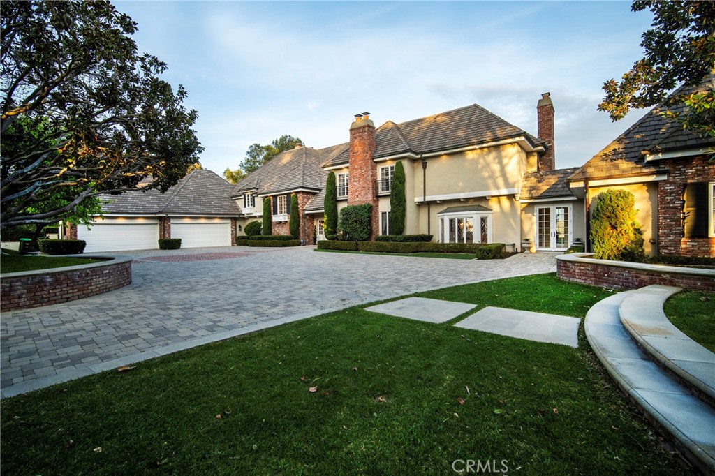 Truly an outstanding opportunity for a meticulously maintained “Ocean View Custom Estate Residence” located within the coveted “Guard Gated” community of Bear Brand Estates in Laguna Niguel. This individually ‘gated' residence boasts approx 9017 sqft & sits on a site of approx. 43200 sqft, with 6 bedrooms, 6 baths, 5 fireplaces, separate library/office & wet bar, formal living & dining rooms, & a most desirable family/great room with ‘indoor/outdoor’ flow to a phenomenally landscaped private rear yard containing a “Pebble Tec” infinity pool & spa, outdoor fireplace & seating area, covered & heated patio & an exceptional panoramic view from the Saddleback Mountain Range to the coastline of the Pacific Ocean! Additional features include an entry foyer adorned with hardwood floors & custom wainscotting, Bonus Room/Gym, separate lower level refrigerated wine room, central air conditioning with 5 separate condensers, 2nd floor laundry room, hardwood & travertine flooring, newer carpeting, a majority of newer interior & exterior light fixtures, numerous French doors showcasing the views and grounds & a 2nd staircase for additional functionality. The gourmet “center island” kitchen contains a 6 burner “Garland” range, griddle, & interior BBQ, 2 dishwashers, 4 ovens, 2 warming drawers, & is contiguous to a full Butlers Pantry as well a walk-in pantry. The Master Suite contains vaulted ceilings, its own wet bar/ kitchenette area, 2 vanities, fireplace, private balcony, an extremely gracious walk-in closet, & jacuzzi type tub offering extraordinary views! This custom residence is absolutely designed with both privacy & the ability to entertain in mind! The outside grounds are both spacious & inviting, containing all the amenities one would hope for. The main floor “Great Room” with vaulted ceilings offers skylights, a grand feature fireplace, wet bar, indoor BBQ, & floor to ceiling bifold doors that “open the entire span of 2 corner walls”. The oversized 4 car garage is accessed by a “flat”, used brick herring bone patterned driveway & contains multiple openers, significant built in cabinetry & is totally finished. Residence is located within minutes of both The Waldorf Astoria & Ritz Carlton Resorts, excellent proximity to the Dana Point Harbor & its Lantern District including the numerous restaurants & shopping. Equally close to the renowned surf breaks of Salt Creek Beach. Excellent access to Freeways for both San Diego & Los Angeles. This is a “Must See”!