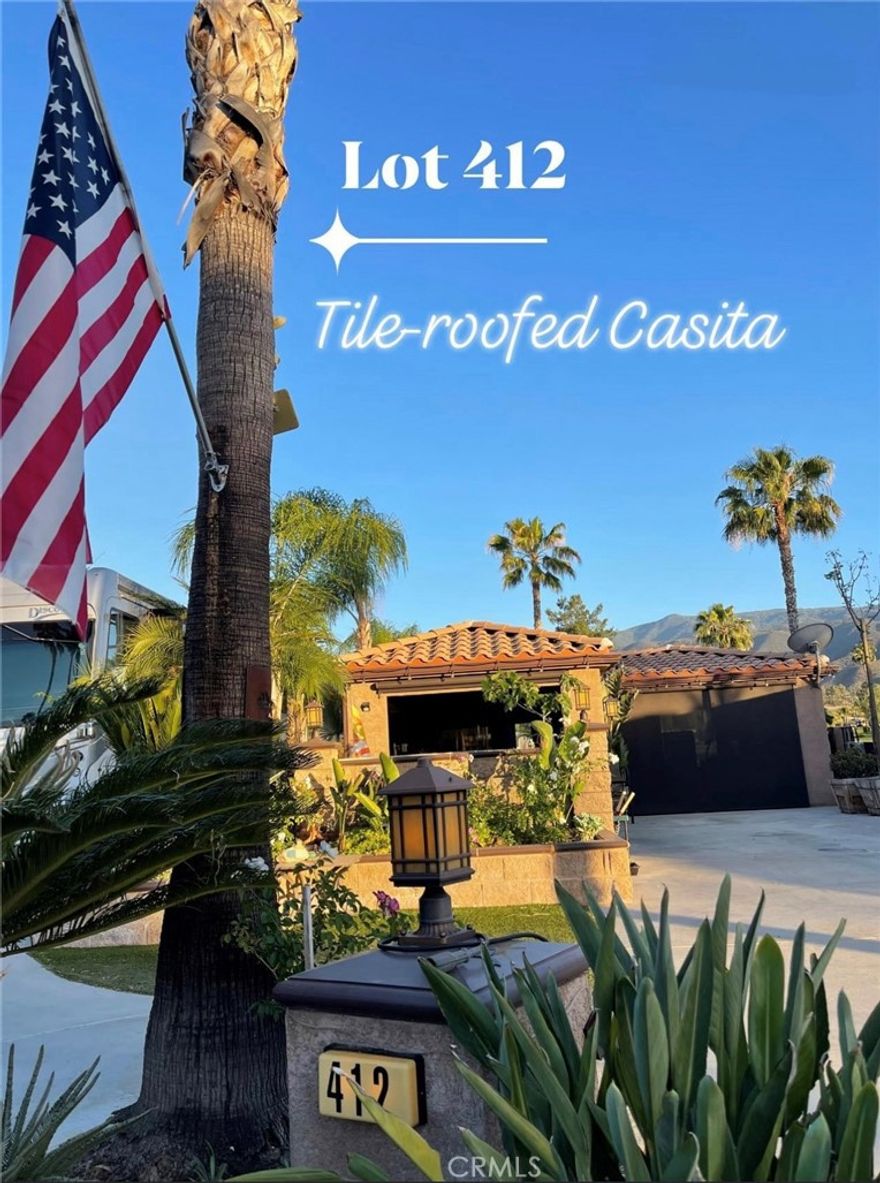 Rancho California RV Resort lot 412 is a premium lot located in front of the Main Club House pool and spa, oversized guest parking and pickleball courts.  This means you and your guests have easy access to all these amenities.  Lot 412 is also located on Hole 11 of the Rancho's Golf Course, over looking endless green, pond, and the ever-changing Palomar Mountain views.  An abundance of wildlife comes to visit your slice of paradise.  The property comes with an enclosed casita with tile roof, gas fireplace, a fire-pit dining table and full kitchen with oven, stove, dishwasher, bbq and ice maker.  The outdoor counter top also has laundry space for washer and dryer, a luxury that has been grandfathered in as W&D and oven & stove are no longer allowed to be built at the Resort.  This property is long enough to park rigs up to 45ft, and still has space for two more vehicles as well as a golf cart.  Call today to access the resort and view this premium site.