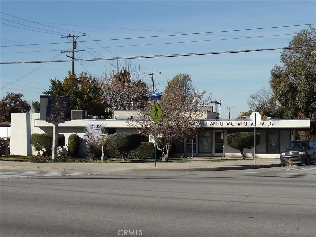 Price is dropped from $1,880,000.00 to 1,699,900.00. Pricing is based on land value only. Good size land and in an excellent location. Situated at the signal corner of Peck Rd. and Ranchito St. Total building size is 3,400 SF. The lot size is 30,284 SF. Current tenants are on month-to-month. Per city: possible for mixed-use, please contact the city to verify.