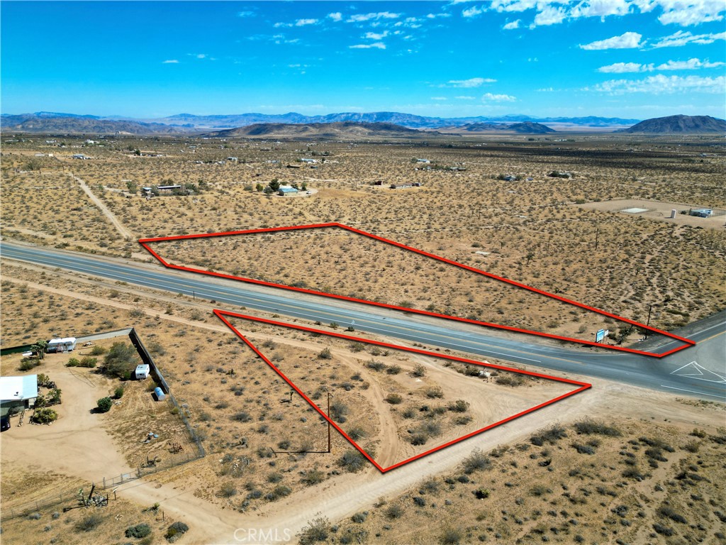 Unlock the potential of this versatile 3.5-acre commercial property situated at the highly visible and strategic corner of Old Woman Springs Road and Reche Road in Landers. This expansive parcel offers a unique opportunity for a range of commercial uses in a growing area with increasing demand.