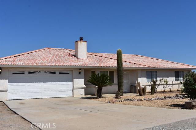 Nice, clean and move-in ready southside home that sits on a nice knoll with great views. 3 Bedrooms, 2 Baths, fresh Paint and New Carpet throughout. Cozy woodstove in Living Room, spacious Family Room adjoins large eating area. Tile countertops and floors. Backyard fenced area. Some landscaping. Zoned for horses and located in the popular Snow Line School District. Within close proximity to Mountain Hi Ski Resort and the quaint town of Wrightwood. Association Amenities: None # of RV Spaces: 0 Special Features: BC,,PTRYNONE Frontage Type: Dirt Road Lot Location Type: On Equestrian Area,Standard Location Landscaping: Partial Special Features: Garage Door Opener # of Attached Spaces: 2 # of Detached Spaces: 0