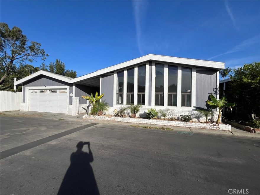 Don't miss this amazing opportunity! This charming home features 3 bedrooms and 2 baths, including a spacious master suite with a full tub, separate shower, and dual sinks. Enjoy multiple living spaces with a formal living room, family room, and a dining area complete with a built-in hutch. Recent updates and new flooring throughout. Additional highlights include a convenient laundry area, a 2-car garage, a cozy patio deck, and a unique side yard.

Situated in a welcoming, family- and pet-friendly community, you'll have access to fantastic amenities such as a large swimming pool, a clubhouse perfect for gatherings, an enclosed spa, and a playground. The location is unbeatable—near the Orange/Anaheim city border, close to shopping, dining, schools, and major attractions like Disneyland, Honda Center, Angel Stadium, and with easy access to the 57 and 91 freeways.