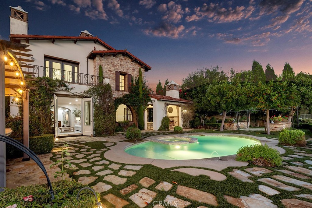 Nestled in the prestigious guard-gated community of Pacific Ridge, this front-row residence offers unobstructed ocean and canyon views and features ~3,912 square feet of refined living space on an oversized ~12,923 square foot lot. With sit-down ocean views and a spacious floor plan, this home is a true gem of coastal luxury. 8 Night Sky offers a main-floor Casita and a second-floor Primary Suite that captures breathtaking panoramic views. In addition, there are two upper floor guest suites and a loft/bonus room, providing flexibility for family living or hosting guests. Nearly every common area, including the primary suite, is designed to showcase the stunning vistas that make this property a standout. Outside, the trophy lot transforms into an Italian-inspired backyard oasis. The grounds feature a sparkling pool and spa, an outdoor BBQ bar, and a covered loggia with a fireplace for year-round enjoyment. Multiple outdoor seating pavilions are thoughtfully placed for relaxing or entertaining, all surrounded by meticulously maintained rose gardens, a grassy side yard, and lush greenery. A long private driveway ensures exceptional privacy while the spacious side yards enhance the home's grandeur. Freshly updated, this residence blends privacy with coastal sophistication and showcases exceptional ocean and canyon views. Its prime Newport Coast location is just minutes from world-class beaches, fine dining, and upscale shopping. Experience unparalleled luxury and make this home yours—a rare offering in one of Southern California’s most coveted coastal enclaves.