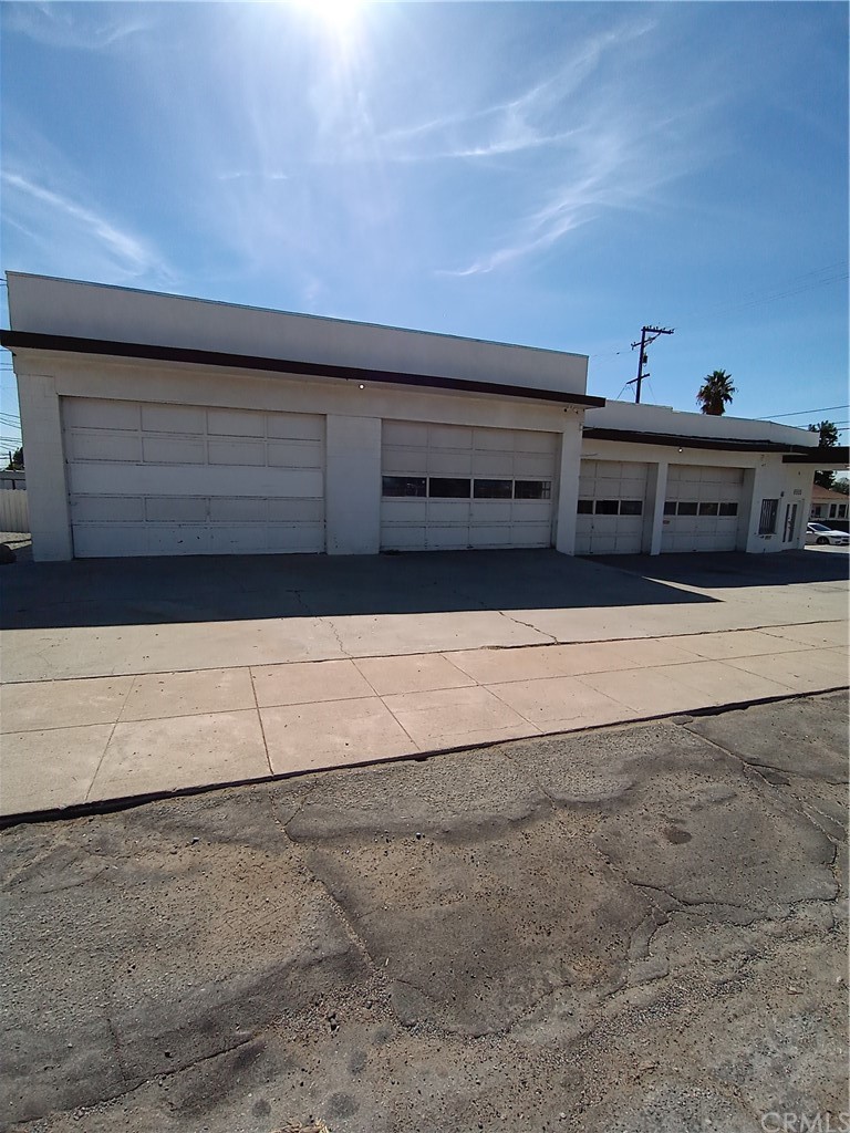 Great opportunity for a classic car brokerage. A Free Standing commercial building located on the corner of Palm Avenue and Pacific Street equipped with 4 bays, each has a roll up door, 1 has a hydraulic lift and 1 has a pole lift. At the side of the building is a gravel lot that can be used for customer or employee parking.