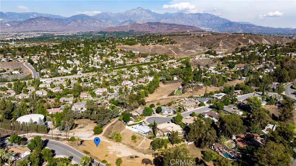 Nearly one acre of vacant land nestled in a wonderful South Redlands neighborhood with views. Build an ultra-contemporary dream home on this unique terrain. Plans were drawn years ago. Bring them back to life!! Utilities are at the street. Close to schools, shopping, restaurants, historic downtown Redlands, ESRI, University of Redlands, Redlands Community Hospital, and Loma Linda University. The seller will offer a package deal if a buyer also makes an offer on 0 E Sunset Drive S, MLS: EV22212267