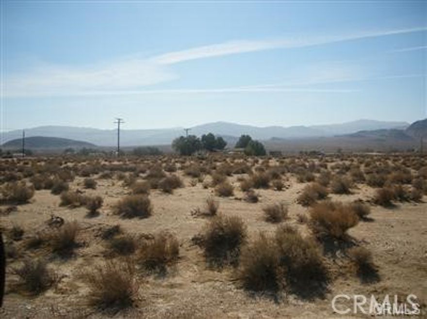 One of the most reasonable priced lots in the area. Very secluded yet not far from National Trails Hwy and Interstate 40.  Beautiful mountain views. Good for weekend getaways and recreation or ranch property.

GPS Coordinates: 34.787161,-116.578417