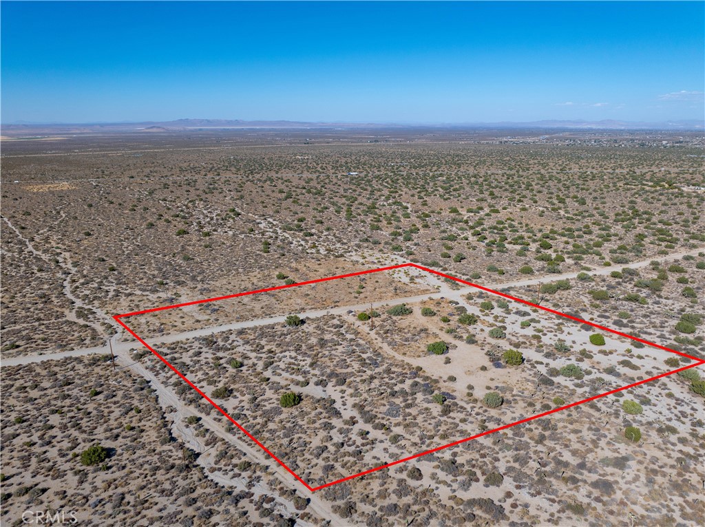 Welcome to this excellent opportunity in Llano, CA 93544! This buildable parcel of land, with APN 3064-002-001-0000, encompasses approximately 8.93 acres and is perfectly situated on a well-maintained dirt road. Electricity is readily accessible nearby, making it a prime location for your new home or project. The property is divided into two parcels by Road Ft. Tejon but is being offered as a single, cohesive lot. All four corners of the property have been clearly marked by a recent survey, ensuring precise boundaries. Additionally, initial permits for construction have already been started, streamlining your development process. Enjoy the serenity of Llano while having the convenience of nearby utilities and a clear path to your construction plans.