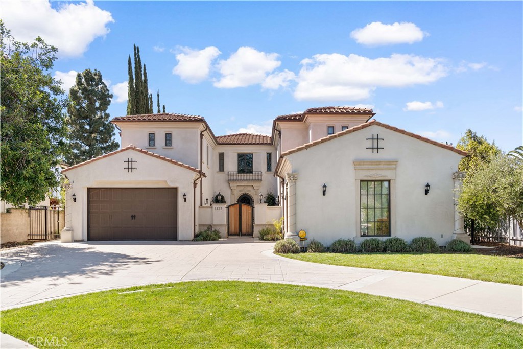 Welcome to this exquisite custom-built estate, a masterpiece of elegance and comfort nestled in one of Arcadia’s most prestigious neighborhoods. Designed by renowned architect Robert Tong and completed in 2020, this breathtaking residence offers 6 bedrooms, 7 bathrooms, and 8,667 square feet of refined living space on a private, gated 0.47-acre lot.
Step into the grand foyer, where soaring ceilings and two dazzling chandeliers set the stage for an extraordinary living experience. The spacious first floor features two stunning living rooms, a chef's kitchen, a separate wok kitchen, a gorgeous dining room, a dedicated home office, a home theater, and a game room with a custom double glass-door wine cellar. A first-floor master suite, along with two additional bedrooms, ensures effortless living.
A private elevator whisks you upstairs to an open and airy second level, where two versatile loft spaces lead to an opulent primary suite and two additional bedrooms, each designed for comfort and privacy.
Step outside to your resort-style backyard, featuring a custom-designed swimming pool, a heated spa, and an elegant outdoor dining area, all surrounded by lush landscaping and ample space for gatherings.
Ideally located within the award-winning Arcadia Unified School District, this home is just moments from Westfield Shopping Mall, Santa Anita Park, golf courses, and fine dining. Experience the perfect blend of exclusivity and convenience in this extraordinary estate.
Schedule your private tour today and step into the luxury lifestyle you deserve!
