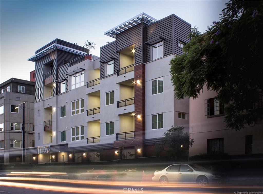 Completed in October of 2015, the Sixth Street Lofts is a 30-unit four-story modern apartment building located in the trendy East Village Arts District in the heart of downtown Long Beach. Currently in lease-up, this property has an excellent unit mix of 9 large Studio units, 15 large 1BR/1BA units, and 6 2BR/2BA units. The units themselves are very impressive with open floorplans, 10-foot ceilings, wood-style plank flooring, luxurious cherry cabinets, designer-appointed granite countertops, walk-in closets, extra storage, individual balconies, central A/C and a complete appliance package that includes a full-sized washer/dryer. Many of the units have outstanding city views as well.
The Sixth Street Lofts offer modern amenities to tenants not always associated with 30-unit buildings. Securitized garage parking offers tenants 42 garage spaces. There is an entertainment lounge available for the tenants and a rooftop deck with a fireplace and great city skyline views. Tenants also have access to a 24-hour fitness room and plentiful bicycle storage. An elevator serves the building, and complimentary Wi-Fi is offered in the common areas. Tenants who work outside of Long Beach can walk to the Metro Blue Line rail system, which is only blocks away.