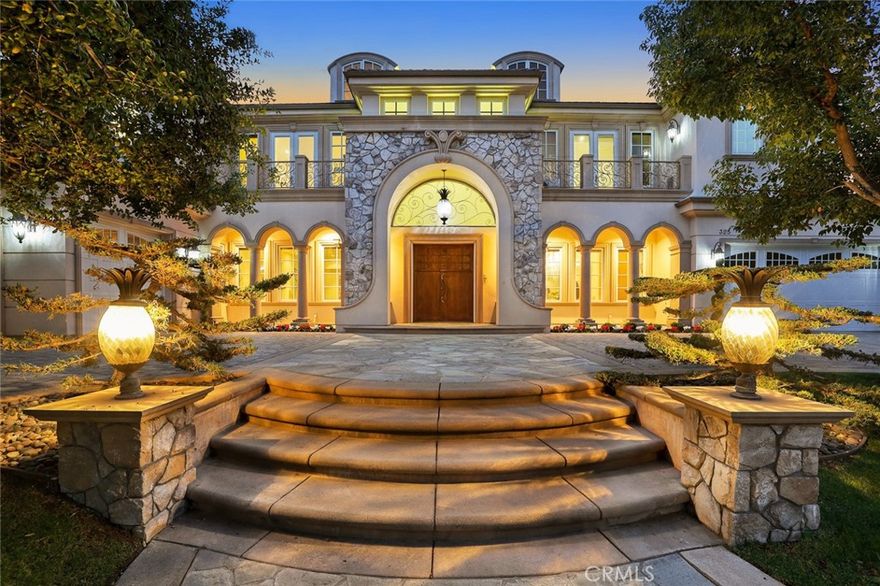 Welcome to Paradise ! This stunning home with panoramic views is nestled on the premier and rarely available north uphill side of Arcadia. Offers a private, gated setting in a 24hrs security gated community. This magnificent estate provides unmatched privacy and seclusion. Originally built in 2005 and masterfully expanded with finest finishes while keeping its pristine charm and character. Spanning approximately 9,594 living square feet. This sophisticated residence is graced by generous high ceilings, recessing lights, high windows throughout. Features huge family room, custom detailed  elevator, Gourmet kitchen with top of line stainless appliances, granite countertops with breakfast nook, complete with a dinning room opens to bundle of natural lights and city views. There is an office with stunning views, 2 en-suite guest bedrooms and 2 seprate guests bathrooms down stairs. Master suite boasts his and hers walk in closers, a retreat area and balcony offering fantastic view, Luxurious bath tub with separate shower. transform the hotel like master suites into tranquil breezy retreats. There is also a bonus room on the 3rd floor which can be used as gym room. The fabulous outdoor paradise offers infinity edge pool, resting area, great place for entertaining. This grand contemporary estate is a dream home that brings the best of sleek elegance of modern living.