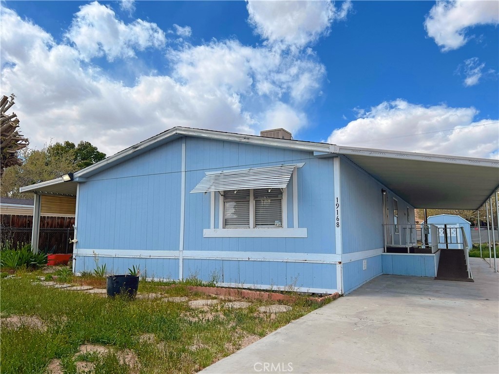 FOR SALE: ±1,512 Square Foot Manufactured Home. No land lease here. Minutes away from the Hesperia Golf Course and Hesperia Lake. Built in 1986 on a ±7,560 Square Foot Lot, fenced all around, with a spacious backyard in the City of Hesperia. The home purchase includes its large carport, covered patios, back shed, two points of access, spacious yard, and large driveway. There are 3 bedrooms, 2 bathrooms, living area, large kitchen with pantry, dining area, and inside laundry room, with lots of open space throughout. With a little updating, this home will be amazing. There is a ramp leading to the back entrance door and stairs to the front entrance. Double swamp coolers allow for great cool air flow during the summer months. Leased out for many years, the owner is now ready to sell to make this a home for the next buyer or a continued investment. This home is nearby all conveniences including retail, medical, freeway, schools, and recreation. Take a look today. Buyer to confirm all details to their satisfaction.
