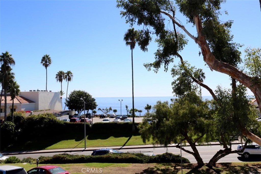 Beautifully remodeled ocean view condo in the perfect location just North of Downtown Laguna Beach. Walk everywhere! Restaurants, Heisler Park, Main Beach, galleries, and shopping are all steps away. 2 bedrooms and 2 full baths offered unfurnished or fully furnished with luxurious designer furnishings. A large balcony stretches across the living room to dining room accessible by two sliding glass doors. Gourmet kitchen with granite counters and travertine flooring, featuring new stainless steel appliances. One carport space is available in the rear of the property, and metered parking all over out front. Private laundry out back door. A perfect location for enjoying the beauty of Laguna Beach~