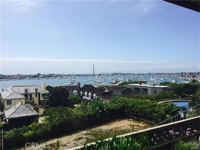 Front row, great panoramic ocean and bay views from this home in the exclusive Irvine Terrace. Price includes the plans for new construction by architect Chris Brandon.