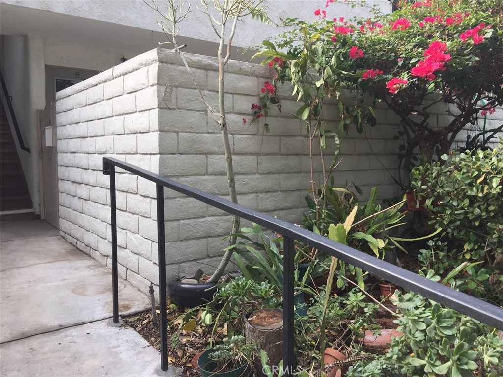 One Bedroom One Bath with Large Enclosed Yard - Newer Windows - no need for stairs = can walk around building - includes refrigerator -