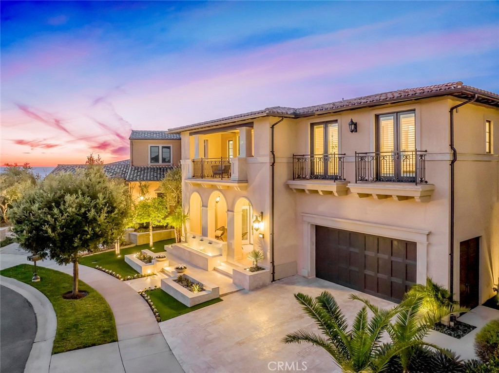 Located within the custom gates of Newport Coast?s premiere private community, Pacific Ridge a 24 hour guard gated Community. This meticulously custom built home is poised atop Newport Coast's landscape, offering unparalleled panoramic views of the Pacific Ocean and Catalina Island. Featuring 5 bedrooms plus a bonus room and 5.5 bathrooms, spanning over 5,552 square feet and nearly a 10,000 square foot lot, it embodies the epitome of luxury living. Walk across recently upgraded all new French oak floors and discover a Custom kitchen adorned with top-of-the-line Wolf appliances, a Chefs Kitchen is apart of the bespoke gourmet kitchen, Wine Cellar, fully Paid for Solar, exterior dining pavilion and covered heated outdoor dining areas. The resort style back yard includes a California room for outdoor dining, a private pool a custom hot tub, a putting green, outdoor dining area, creating a perfect haven for relaxation. Additionally, enjoy outdoor gatherings at the fully custom built in barbecue with outdoor kitchen. The primary suite, a retreat in itself, features a balcony fit for entertaining against the backdrop of stunning views of full panoramic Catalina, San Clemente Island views. This property transcends the ordinary, offering a rare opportunity to own an exceptional Newport Coast residence. Elevate your lifestyle amidst the sophistication and grandeur that defines this extraordinary treasure. Your destiny unfolds in these exquisite halls of refined living. Enjoy World Class Resorts and Shopping with Pelican hill Resort and Fashion Island Mall minutes away. Tom Fazio Pelican Hill Golf Course.The home is truly one of the finest Coastal California has to offer.