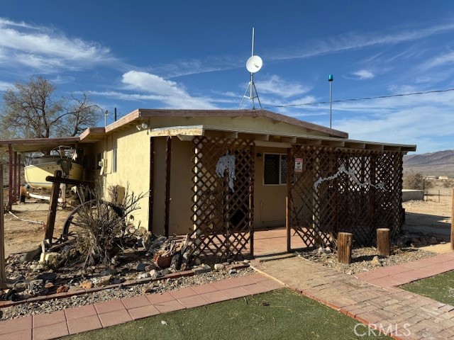 Imagine, 17 beautiful Mojave Acres! This charming, two-bedroom, one bath home sits on a wide spread of beautiful land that will give you all the privacy and solitude you could ever ask for. This rustic beauty could use some updating and attention but with the spectacular views and gorgeous surroundings, it will be well worth the effort. On the east side of the property there is a slab foundation and a 2nd power pole. The property would be perfect for an investor or someone seeking to create their desert getaway. Bring your tools and come see something very special today!