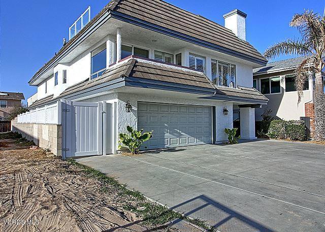 LOCATION LOCATION. Steps to the sand at the Mandalay Shores beauty. Amazing views from living area, dining room, 2nd level deck and roof deck. Two bedrooms on the first level, with a full bathroom and laundry room. Entertain with the chefs kitchen with newer appliances, newer cabinets and Quartz countertops. Kitchen is open the to family room, with open beam vaulted wood ceilings, wood like flooring. Large master suite with walk in closets and large private deck. Soak in the views from an amazing roof top deck. Large backyard, newly landscaped with spa, great for enjoying after a day at the beach. Owner has permitted plans to push front deck out across entire house . Any plans and permits would be included in sale.