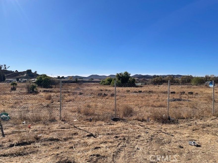 This flat, 4.70-acre Parcel is a great development opportunity. Per the City of Menifee, the property is currently zoned LDR-2, which may allow 7200 sq.ft. lots. There are many new home developments nearby. Buyers are advised to do their due diligence and check with the City regarding the potential development of the property