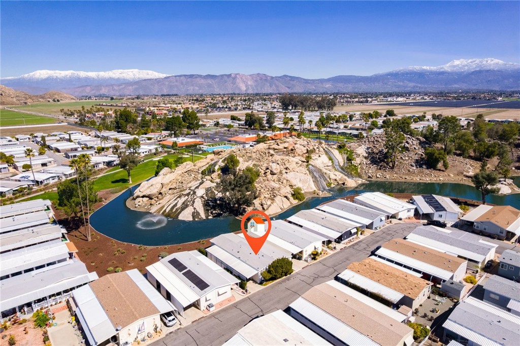 BREATHTAKING VIEWS OF THE LAKE & WATERFALLS, LOCATED IN ONE OF THE MOST DESIRED AREAS OF THE VALLEY, NEW ON THE MARKET, TURNKEY, LARGE OPEN FLOOR PLAN, REMODELED KITCHEN, WITH ALL NEW APPLIANCES & NEW FLOORING THROUGHOUT, WIDE HALLWAYS, CUSTOMIZED WHEEL CHAIR ACCESSIBLE, INCLUDES AN EXTERIOR LIFT & A SEPARATE RAMP, PLENTIFUL STORAGE, AN OUTDOOR PRIVATE BARBECUE AREA WITH TILED COUNTERS, A LARGE WORKSHOP & STORAGE AREA. RELAX IN YOUR LIVING ROOM & ENJOY THE VIEW ALSO THE PAINTINGS BY A LOCAL ARTIST. EXPERIENCE A BEAUTIFUL PARK WITH ALL OF THE AMENITIES, 24 HOUR SECURITY, GATED WITH ATTENDANT, COMMON RV PARKING, FISHING, GOLF, GYM, BANQUET FACILITIES, CLOSE TO SHOPPING, RESTAURANTS & SO MUCH MORE.. CALL TODAY & MAKE THIS YOUR FOREVER HOME!!