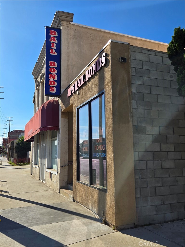 Property has 4 units commercial space at street level and two 1 bedroom apartments above. Enclosed balcony at 2nd floor. Parking spaces for 8 cars and security gate. Interior Photos are older. Located in desirable area of Central Gardena. Good opportunity for investors. Drive by only, do not walk property and do not disturb tenants.