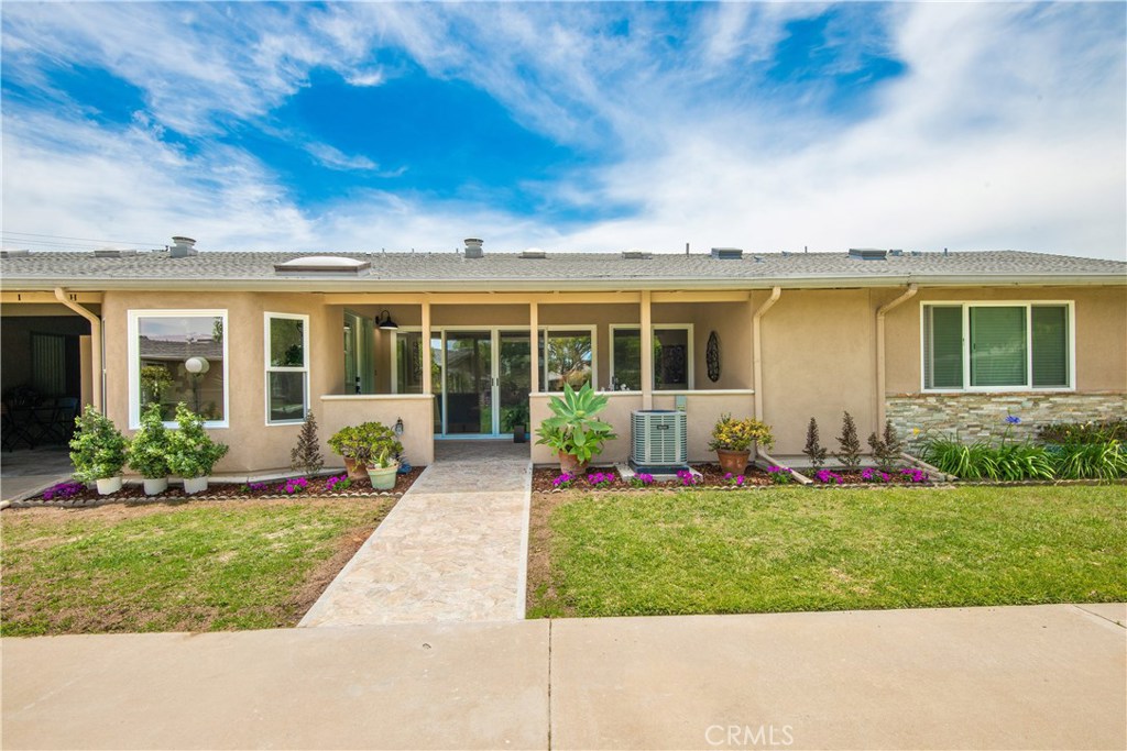 AMAZING LOCATION!! This Fully Remodeled, Partially Expanded, 2 Bedroom, 2 Full Baths Unit has Spectacular Greenbelt Views from every Room. Flagstone on Patio, Custom Leaded Glass Door, Dual Pane Windows, Large Sliding Glass Door in Living Room and Bedroom, Luxury Laminate Flooring, 3 Large Skylights, Sink in Kitchen Island, Stainless Steel Appliances, Quartz Counter Tops, Custom Glass Shower Enclosures in Both Bathrooms, Custom Ship Lap Accent Wall in Kitchen and on Kitchen Island. Lots of Storage. Large Walk-in Closet, Central A/C and Heat, Full Size Washer/Dryer. (Carport 181 , Space 05). SENIOR COMMUNITY-OFFERS THE FOLLOWING AMENITIES: 9 Hole Golf Course, Swimming Pool, Jacuzzi, Gym, Table Tennis, Shuffle Board, Billiards, Pickle Ball, and Bocce Ball courts. Amphitheater, 6 Clubhouses featuring: Art Room, Sewing, Crafts, Wood Shops, Lapidary, Pool Tables, Over 200 Clubs, LWSB is a Security-Guard-Gated Community. Also Library, Friends of Library Bookstore, Credit Union, Health Care Center, Pharmacy and Post Office.