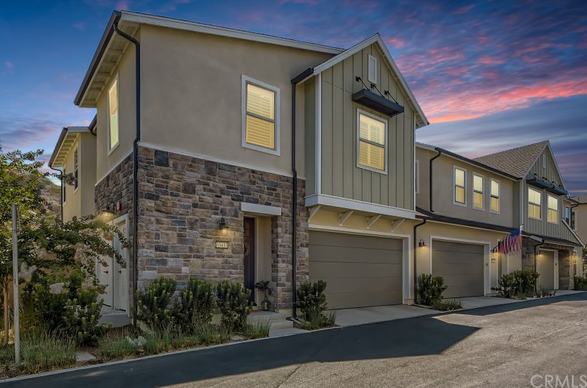 This gorgeous 3 bedroom, 2.5 bath plus loft exudes luxury. Located in one of the newest gated communities in San Juan Capistrano, The Cove at Pacifica San Juan, is just minutes from the Dana Point Harbor and famous Doheny Beach! Entering the home you are greeted with an open concept with great room, kitchen and dining room area. The designer gourmet kitchen features white quartz countertops, glass tile backsplash, upgraded stainless steel appliances and farmhouse sink. Leading upstairs features 3 bedrooms and a loft with laundry room. The elegant master suite, includes an oversized walk-in closet, spacious en-suite bathroom with designer shades, dual sink vanity, custom over-sized tub, walk-in shower with seating and stunning views of the backyard and hillside. Located up against the hillside, this home offers ultimate privacy and with one of the largest lots in the community the seller took full advantage with a custom-built seating area with natural gas firepit, built-in BBQ and turfed side yard. The sellers spared no expense with over $150,000 in builder upgrades and backyard customization. Attached is a two-car garage with EV charging capability. Pacifica offers a clubhouse featuring an Olympic size salt water pool, spa, cabanas, fitness center & BBQs, extensive seating, walking trails, parks, citrus groves and look out points to Dana Point Harbor.