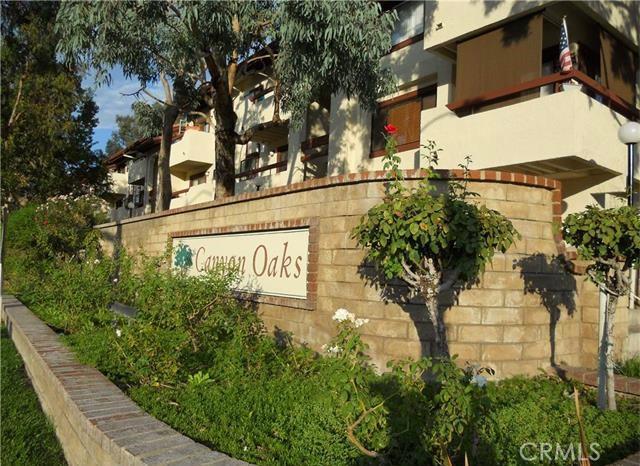 Welcome home to this delightful end unit condo! Located in a highly desirable area of Canyon Country with mountain views. This condo features 3 bedrooms 2 bathrooms with an updated Kitchen with granite counter tops, stainless steal appliances, ceramic tile flooring and a private balcony overlooking the mountains. A lovely master bedroom with a walk-in closet, hardwood flooring throughout, carpet in two of the bedrooms, dual pane windows, and central air. This end unit is considered to have the largest floor plan in the complex, with over 940 square feet of living space. Canyon Oaks complex features, pools, jacuzzi, and playgrounds. Get ready to call this your home!