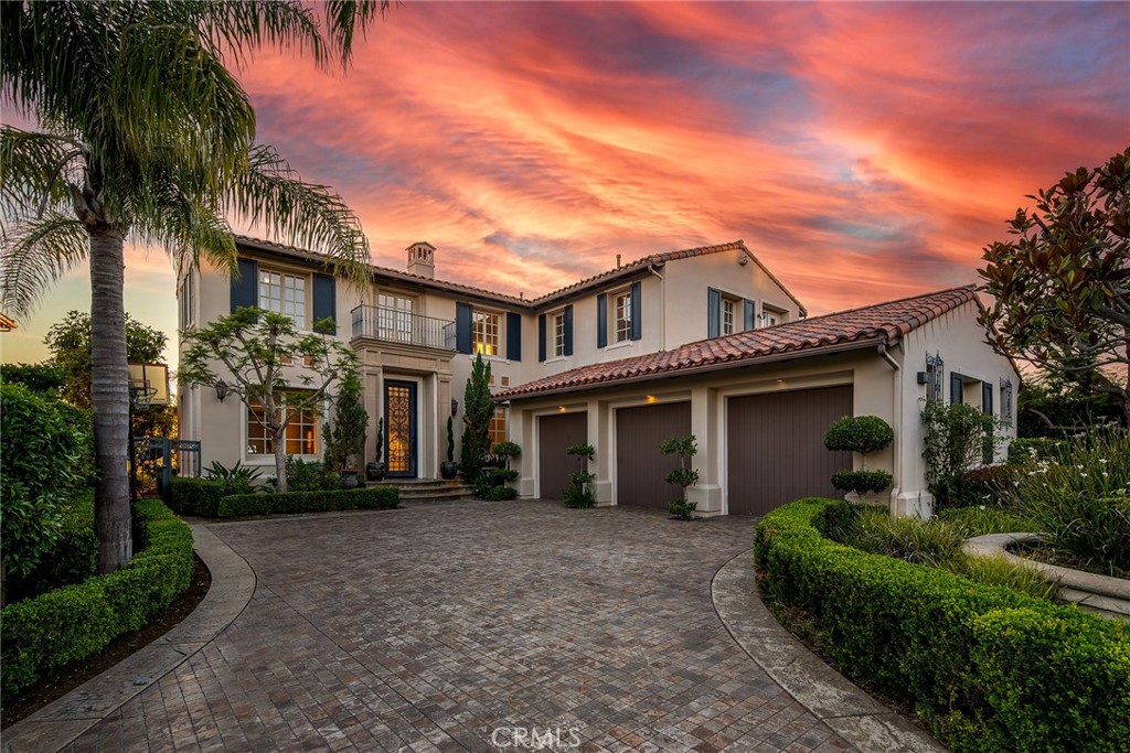 One of the finest estates in the prestigious guard-gated community of Pelican Heights, The formal living and dining room opens to the extensively landscaped yard with unobstructed sunset views of the ocean & city lights. Private landscaped yard boast approx. 11,000 sq. ft. of ideal entertaining & relaxing space with picturesque views, granite bar with built-in barbecue, and saltwater pool & spa. The kitchen with top of the line appliances, granite counters and center island, dining area, custom cabinetry, crown molding, butler’s pantry with chilled wine storage. The master suite and sitting area offer breathtaking views and a sense of home. The master bath with crystal chandelier, Jacuzzi tub, dual sinks and vanities are bathed in marble with inlaid tiles that create a work of art. Magnifying this home's appeal even further is a three-car garage sporting modern gray tile and sleek silver built-in storage units