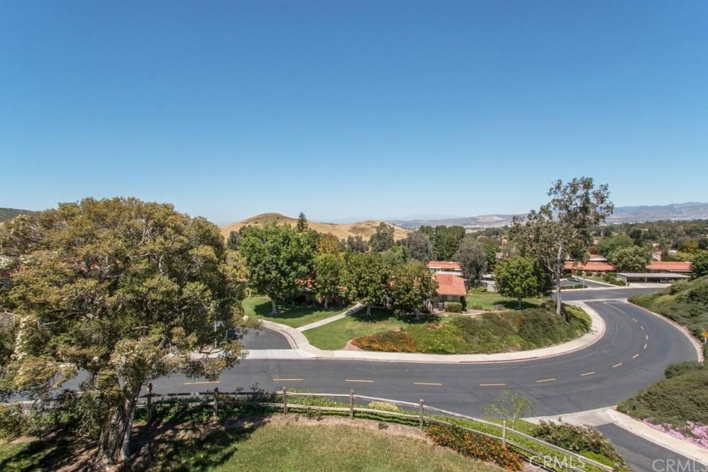 One of the best panoramic scenic views of Saddleback mountain in the Senior Community of Laguna Woods. Totally and completely REMODELED. Central heat and air, granite counter tops in kitchen and baths, Open kitchen with Island center. Tiled entry and wood flooring throughout. Samsung stainless steel top of the line appliances in Kitchen. Dual paned windows throughout including slicer glass doors. Tiled custom showers and bath. Custom front door. Walking distance from Club House 6 with Pool. Senior community 55 plus in age. 27 Hole championship golf course and also a 9 hole executive walking 3 par course. 7 Clubhouses, 5 swimming pools, tennis courts, lawn bowling, pickle ball courts, shuffleboard courts, craft clubhouses with lapidary, painting, photography, sewing, quilting, sculpting, game rooms with billiards, cards, a Bridge Club, several gyms and work out rooms, Horse stables with breakfast rides, an 850 seat Theatre Arts Center, over 200 special interest clubs and much, much more. All inside a guarded, gated community.