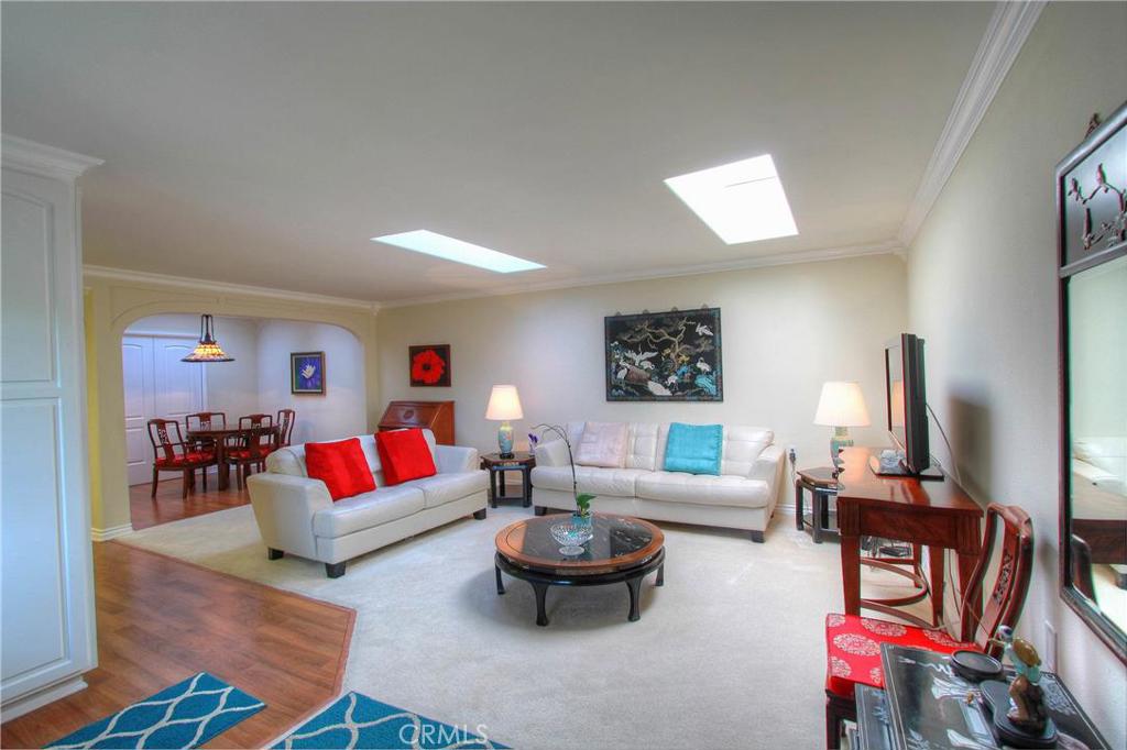 Gorgeously Remodeled Barcelona Home in the Prettiest Location available with the Green Belt and Nature Path (The "Serpentine") Just Outside Your Front Door. This Fantastic Ground Level Unit (No one above or below you!) features Sophisticated Granite Countertops and Beautiful Custom Cabinetry in the Kitchen (with Sliding Pantry Shelves) and Baths. Skylights provide Warm Natural Lighting to Your Spacious Living Room and Elegantly Arched Dining Room Area. The Master Bedroom has its own Custom Bath, Large Closet and Direct Access to Your Private Patio through Your French Doors. The Secondary Bedroom also enjoys its own Skylight and Built-in Closet Amenities. Don't Overlook the Newer Windows and Beautiful Front Door, Custom Flooring, Crown Molding Throughout, High Ceilings, Walk-in Tub and Elegant Sinks, Fixtures as well as the Wonderfully Quiet and Convenient Location with Easy Access to Shopping. This Wonderful 55+ Gated Adult Community has over 200 Social Clubs, 27 Hole Golf Course, 7 Clubhouses, 5 Pools, Fitness Centers, Library, Computer Center, Garden Center, Equestrian Center, Free Bus System, 24 Hour/Day Guard-Gated Security and Much, Much More. A Must See!