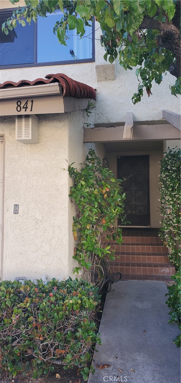 This beautiful townhome in the highly desirable commubnity of "Malvern Creek" is now available for rent. As you step through the front doors, you'll immediately notice the vaulted cathedral ceilings making the space open, bright, and airy. The home has been freshly painted, has recessed lighting throughout including a dimmer in the living room, newer vinyl dual pane windows, and brand new carpet. There's an attached 2 car garage, central HVAC, and laundry hookups in the garage. The patio faces a beautiful green belt with palm trees in the backyard for that extra privacy and shade. Conveniently located only a couple of homes away from the community pool and clubhouse. Walking distance to "Amerige Heights" shopping center with tons of restaurants, market, and Target. Don't forget about the highly rated Fisler Elementary/Junior High and Sunny Hills High School!