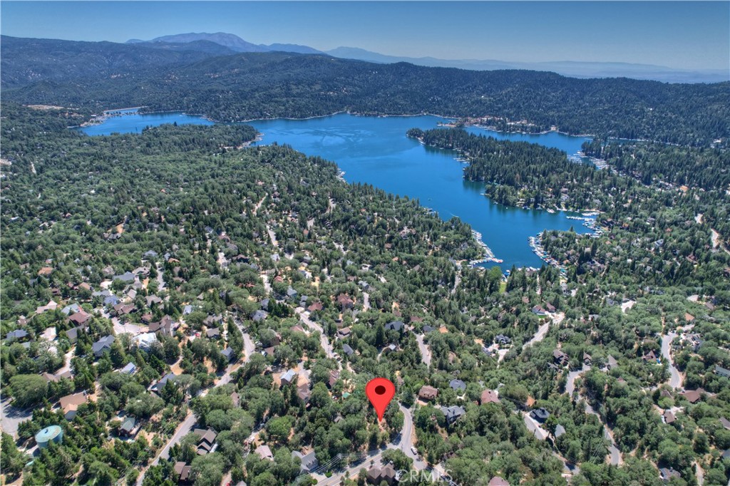 Explore an exceptional opportunity to bring your dream home to life, complete with lovely lake views. Nestled on the north side of town, perfectly situated between scenic trails and the tranquil waters, this lot awaits your creative touch. Detailed plans are meticulously drawn and engineered, ready for the county's final approval. You even have the option to add your personal finishing touches to truly make it your own.
Significant progress has been made with essential committees and authorities:
Land Survey Completed
Geological Survey Completed
Plans in engineering phase with Kadtec
Impressive 3283 sqft of living space, including 5 bedrooms and 3 baths
Convenient 2-car attached garage
Enjoy views of the lake from the wraparound porch
LACSD Issued Conditional New Construction Service Availability Letter, with Water/Waste Systems Application package prepared
San Bernardino has issued the address: 27588 Matterhorn Drive
San Bernardino Plans review fee pending
AWAC Plans APPROVED, permits pending
Building Permits Ready to issue, fee pending
This unique opportunity invites you to realize your vision of a custom home, perfectly blending modern living with the natural beauty of the surroundings. Don't miss your chance to own this remarkable piece of real estate. Act now and turn your dream home into a reality!