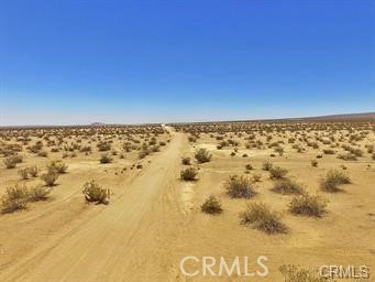 There is not an address associated with this parcel. What is reflected is the Parcel# 277-082-01-00-9 which is +/-19.51 AC. Zoning is O/RA. Located in California City. Access via dirt N. Columbia Rd.
