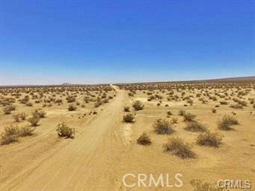 There is not an address associated with this parcel. What is reflected is the Parcel# 277-082-01-00-9 which is +/-19.51 AC. Zoning is O/RA. Located in California City. Access via dirt N. Columbia Rd.