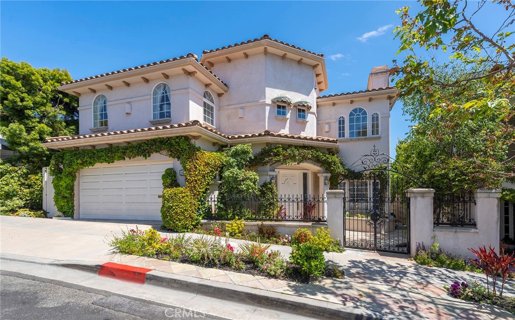 More pictures coming soon. Experience the height of Orange County coastal luxury living in this immaculately maintained French Chateau inspired ocean view home in illustrious Corona del Mar.Step through the gated front porch entryway with slate deck and step inside to find a light-filled
open floor plan brimming with desirable features including soaring 28’ ceilings, ample picture WIndows, handsome marble flooring, elevator, and grand staircase with custom wrought iron
railings leading to the 2 nd level with dual Romeo and Juliet balconies.
The updated chef’s kitchen is ideal for hosting and includes top-tier appliances, vaulted ceilings,
ample cabinet space, seated center island, and breakfast nook for casual dining.
Host soirees and celebrations in the formal dining room with seating for 10, or unwind in the
step-down family room with fireplace, custom built-ins, and glass slider opening to the large
ocean-view sundeck perfect for indoor/outdoor living and endless sunsets.
Grab a book or get some creative work done in the private library with bespoke shelves, built-in
desk, and handsome views of Bucks Gully and the azure Pacific Ocean.
Relax and enjoy stunning ocean views from the resort-inspired primary suite with fireplace,
walk-in closet, attached study, soaking tub, walk-in shower, dual vanities, and direct access to
the private deck with sweeping views of the coast.
Surround yourself with nature outside on the lush grounds with ample gardens and flora, as
well as a serene stream running directly to the ocean.
A first level en-suite bedroom is perfect for guests and includes a separate entrance, while two
additional 2 nd level bedrooms and den/3 rd bedroom are ideal for family, gym, or media room.
Located steps from all the fine dining, retail, and legendary beaches of Corona del Mar and only
two blocks from Ocean Blvd., this captivating, custom designed home offers the quintessential
OC coastal lifestyle in one of Southern California’s most desirable seaside locales.