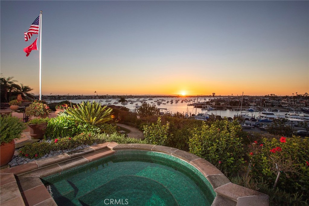 Seize the rare opportunity to live atop one of the most coveted waterfront views in Corona del Mar. Three bedrooms and three-and-one-half baths are encompassed within this estate’s generous nearly 3,700 square feet of living space—and outdoors, approximately 113 linear feet of unobstructed view frontage showcases incredible vistas of the California coastline, from the Newport Beach Harbor and Balboa Pavilion all the way to Catalina Island. The home has been in the same family for several generations and has experienced many heartfelt celebrations of life; now it is just waiting to become a cherished dream home for a new generation. The property truly captures the essence of classic Spanish architecture with its authentic attention to detail—but if you have a different artistic vision for the oversized lot, this is your chance to complete entirely new construction from the ground up.