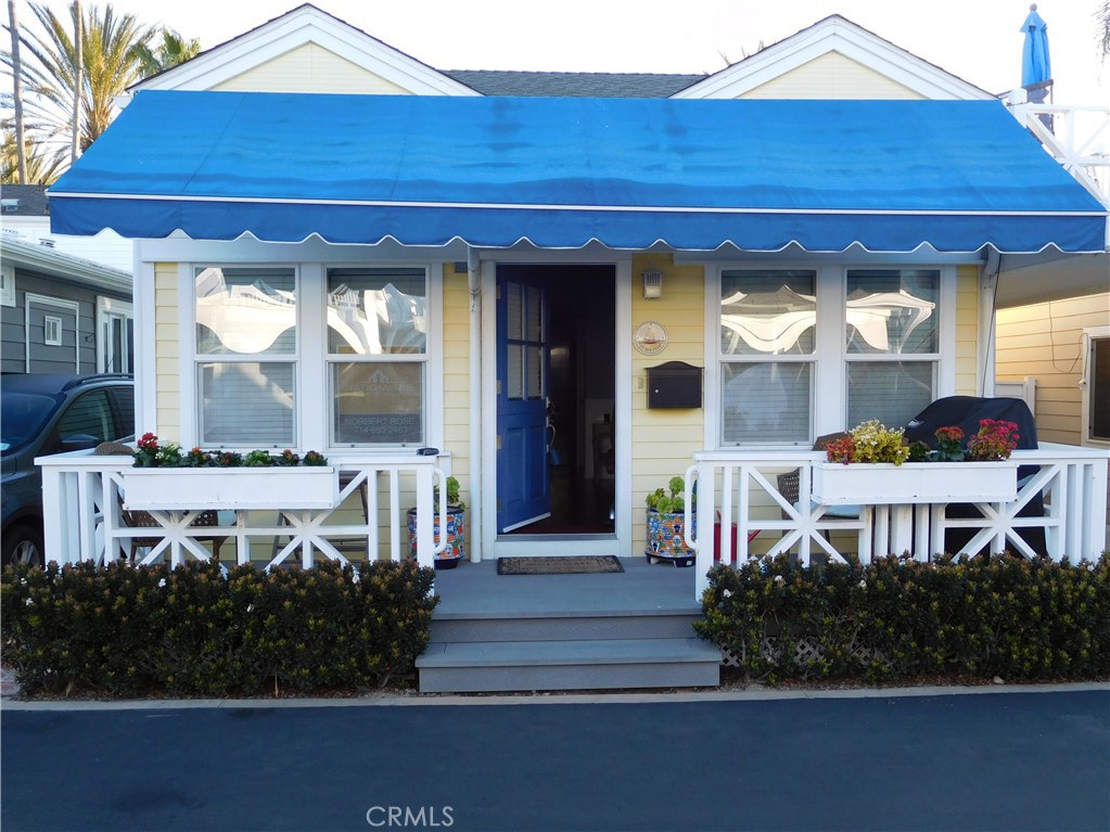 Charming beach cottage in Lido Peninsula resort in Newport Beach. This cottage has 2 bedrooms, 2 bath and a loft/Office, with lower and upper suites. Hardwood floor throughout with updated kitchen with stainless steel appliances, quartz counter top and custom cabinetry. Stackable washer/Dryer in down stairs closet, forced air & heat. New composite rear deck. South west facing deck to enjoy the Newport sunsets before you take a walk to one of the nearby restaurants for dinner like Sabatino's, Blue Water Grill, Cannery, and Lido Marina Village. The resort includes a private pool & spa, club house and fitness room, private beach with barbecues available for get togethers with friends & family. Owner occupied only. No short term or long term rentals. Land Lease of $2290.00 Monthly. Price includes most furnishings. Seller Wants it Sold, Bring Offers.