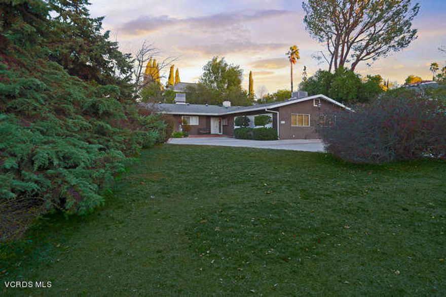 LOCATION LOCATION LOCATION, great corner location just across the street from Pierce college campus. Home needs some TLC but look at online values! Located on huge lot, almost half an acre! Master bedroom with remodeled bathroom and window shutters.