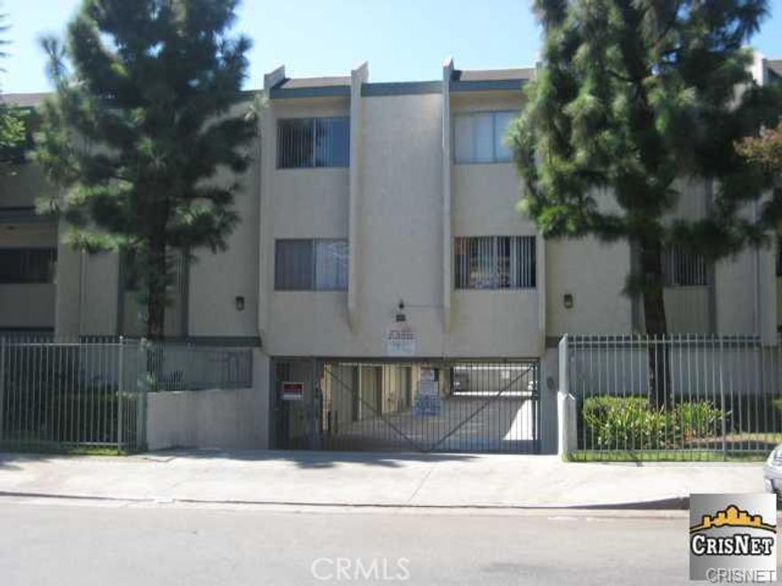 Sought after 3 Br+2.5 Bath End Unit Tri-level Townhouse,  Over 1853 sq ft (asessor) of Living Space with Two Balconies, Direct access Attached Garage. Features Formal Dining Area, Den or Bonus Room adjacent to Kitchen, Laundry Room with extra spacious Storage Area for all your stuff!  Master Bedroom with Balcony, Walk In Closet, Over sized Masterbath has Dual Sink and Decorative Wall Tile.  Built In Wet Bar with Sink in Living room with Fireplace.  Brand New Air Conditioner installed and New Roof completed through out the complex. Low HOA Dues with only 28 units in a Gated and well maintained complex. Conveniently located near Bus lines and Shopping.