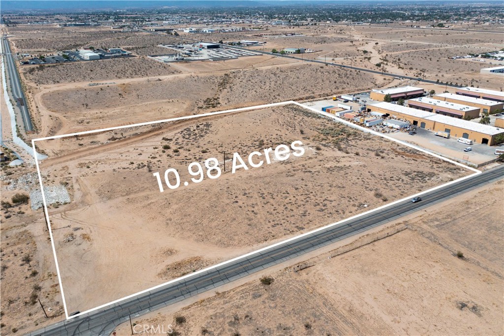 The zoning allows for a variety of industrial and commercial activities, making it ideal for development into warehouse or industrial facilities. Here's a breakdown of the permitted uses:
Commercial storage facilities (mini-warehouse).
Contractor’s storage yard.
Equipment (large) sales and rental.
Equipment (small) sales and rental.
Lumber yard and building materials (wholesale).
Manufacturing (indoors).
Offices (administrative, business, executive, and professional, excluding medical or dental).
Outdoor storage, incidental to the primary use.
Publishing and printing.
Retail sales ancillary to a manufacturing use on-site (floor area not to exceed 15% of gross floor area up to a maximum of 7,500 square feet).
Truck terminal.
Vehicle repair – major.
Vehicle repair – minor.
Vehicle wash facilities.
Warehousing and wholesale distribution centers – 200,000 square feet or less.
Accessory structures and uses customarily incidental to any permitted uses when located on the same site with the main building and use.
Veterinary services - clinics and small animal hospitals (short-term boarding).
Other similar uses, as interpreted by the Development Services Director or his/her designee.
This information provides a clear understanding of the potential development opportunities for the land. If you're interested in purchasing or developing this property, you may want to consider conducting further research and due diligence to ensure it aligns with your objectives and meets any specific requirements or regulations.