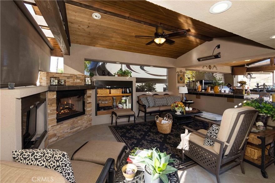 Check out the Gated entry to this amazing Waterfront property. If you want Views, you hit the lottery here, you get Mountains, Water, 14th hole Golf green, and Sunrises, what else can you ask for? First thing you see is a Water Wall stack rock front entry with drought resistant plants, pass through the gate and you are presented with a warm gathering area fully screened in with Fireplace and appliance stocked Kitchen.  Dishwasher, Built-in BBQ, Toaster oven, 2 water heaters and lots of Storage. Outside patio has a retractable Awning with Washer/Dryer, Cooler, Freezer, Ice maker and Island Fridge. The Gorgeous Gazebo is perfect for dinners right next to the water and the patio has entertainers vibe written all over it.  Come check this one out to get the real feel for the experience. Financing Available....

Included in Rancho California RV Resort is a 14 hole Executive Golf Course that is free for owners, 5 Pools and Jacuzzi areas, Tennis Courts, Pickle Ball Courts, Laundry Rooms, Dog Park, Horse Shoe Lawn, Club House, Hiking Trails, and Restaurant all inside Gated Community that is Guarded 24/7. You can live here or rent your space. Peace and quiet serenity all just 25 minutes from Temecula Wine Country. No age restrictions. Come on over and check this hidden gem of a place out... Financing Available....