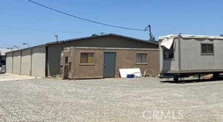 Commercial Light Industrial Warehouse Building with two additional Structures well suited for Office, Cannabis Retail. Property formally operated as a Cannabis Dispensary. Located in City of Perris, with easy freeway access, and frontage. Perfectly suited for high visibility signage with unobstructed freeway views. Very few warehouse buildings are available in the area. Hurry this opportunity will not last.
